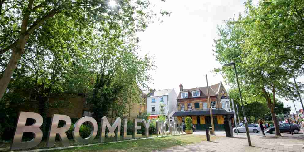 Bromley North sign on a tree-lined street